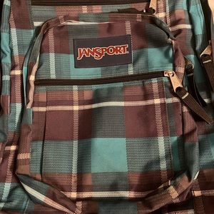 Used Jansport Backpack… teal and black plad.. bought at Tulleys…